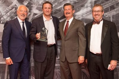 Ross Myers, Brett Hitt, Bob Wells, and Brian Kleiner pictured with Brett receiving the Myers-Lawson Award